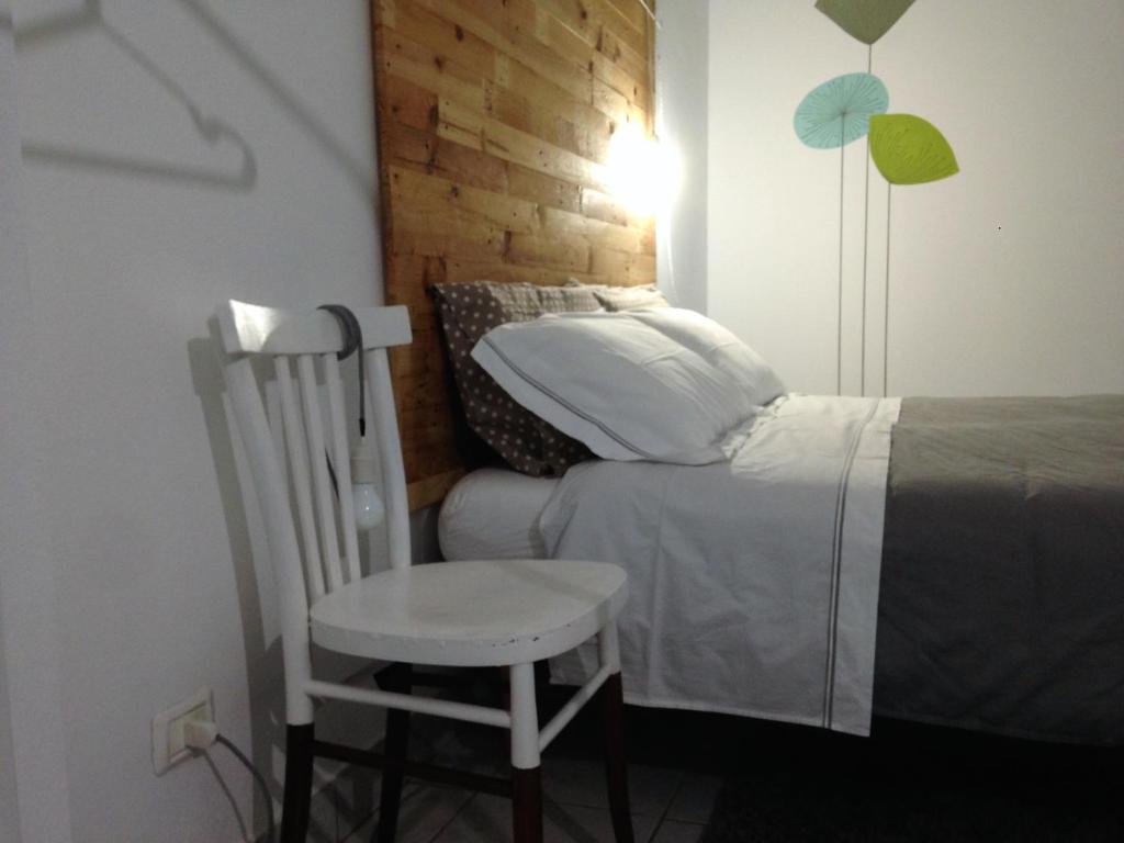 A bed or beds in a room at Alloggio OpenSpace da Irene
