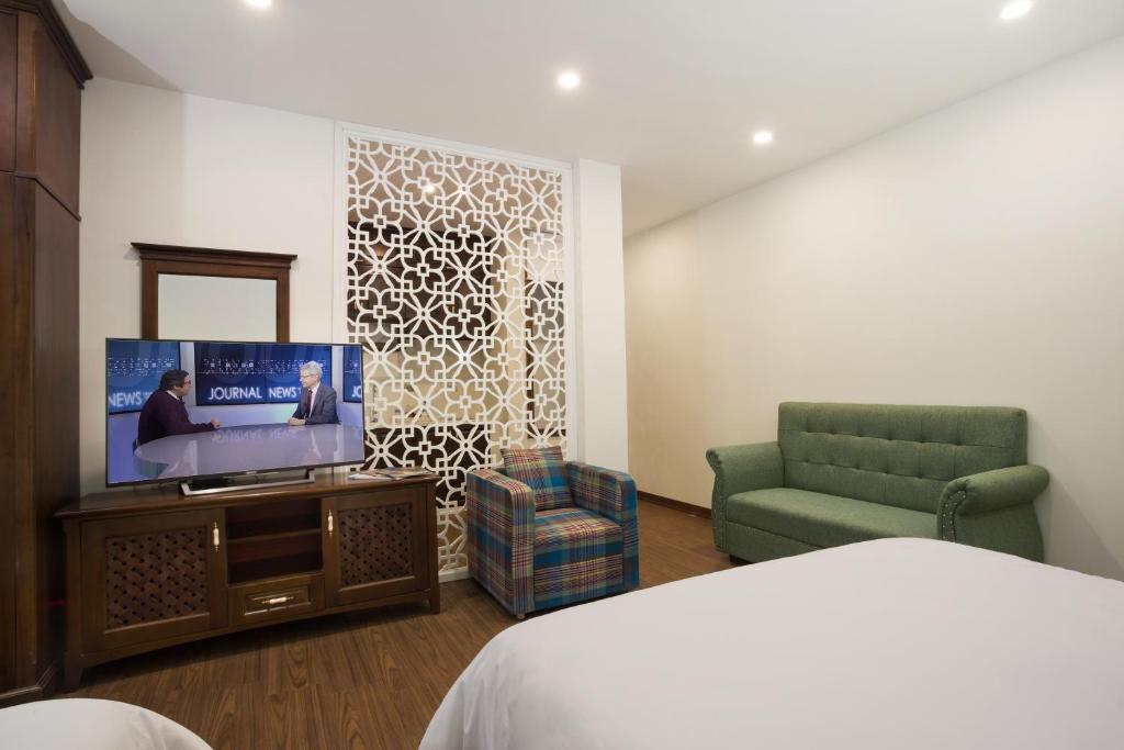 TV a/nebo společenská místnost v ubytování Maro Hotel