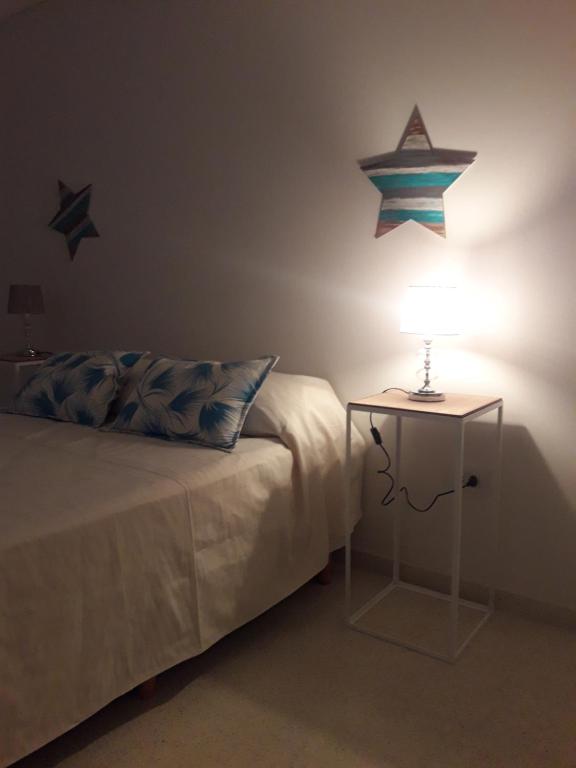 Cama o camas de una habitación en Complejo Pirovano