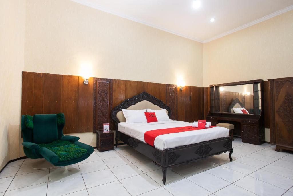 RedDoorz near Brawijaya University tesisinde bir odada yatak veya yataklar