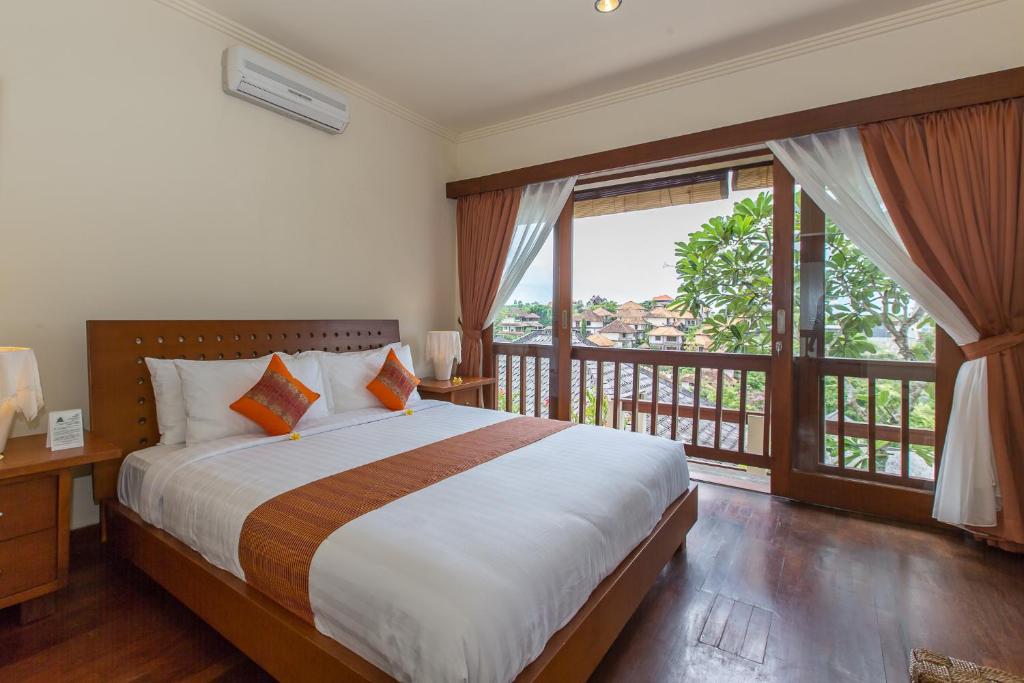 Lova arba lovos apgyvendinimo įstaigoje Villa Lidwina by Nagisa Bali