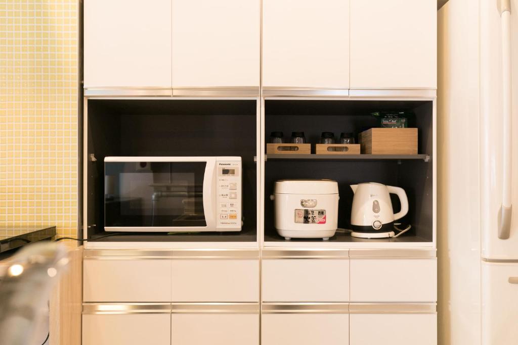 Kuchyň nebo kuchyňský kout v ubytování hostel DEN