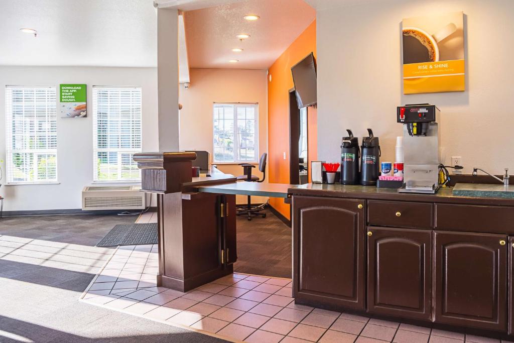 a kitchen with a counter top in a room at Motel 6-Newport, OR in Newport