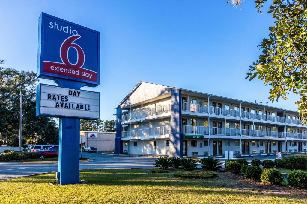 a sign in front of a building at Studio 6 Extended Stay - Savannah, GA in Savannah
