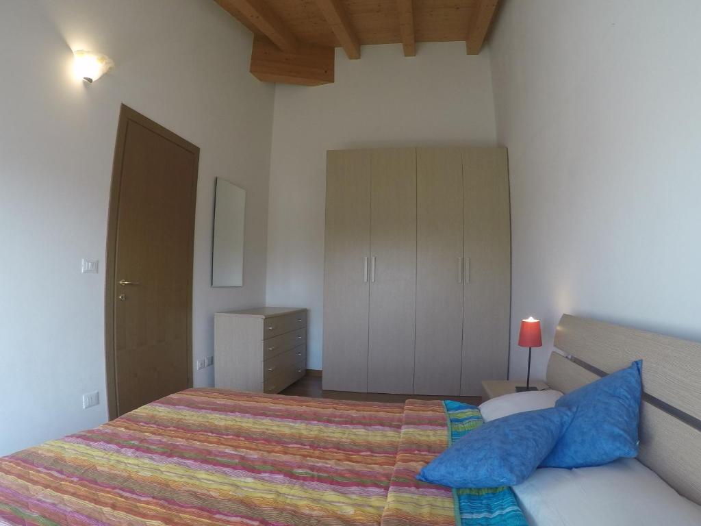 Postel nebo postele na pokoji v ubytování Residence Caorle Apartments - Agenzia Cocal