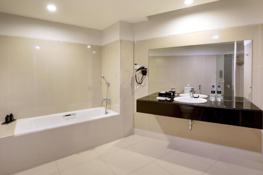 Koupelna v ubytování Hotel Neo Palma Palangkaraya by ASTON