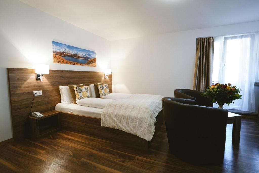 Postel nebo postele na pokoji v ubytování Hotel Römerhof