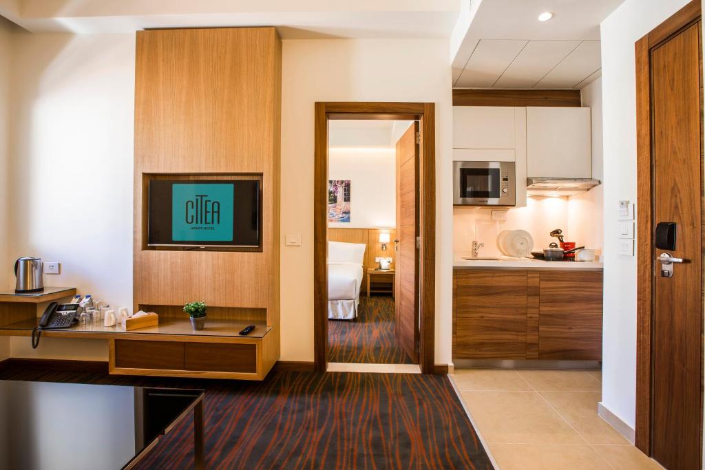 Kuchyň nebo kuchyňský kout v ubytování Citea Apart Hotel