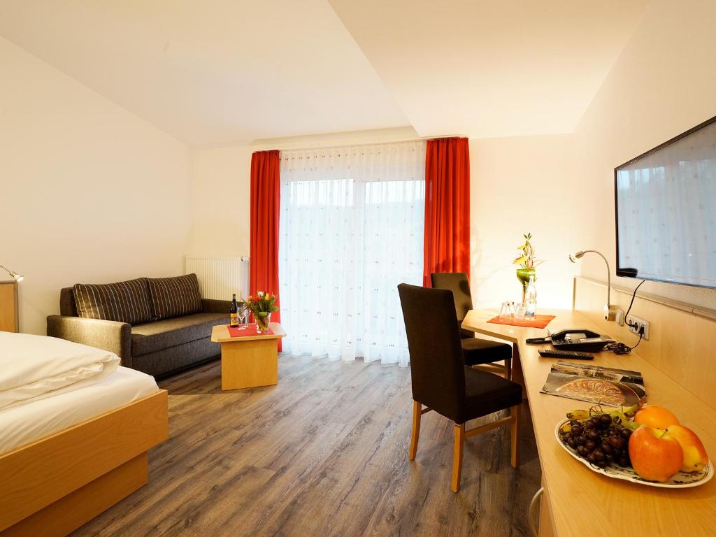 Posezení v ubytování Hotel Gasthof zum Biber