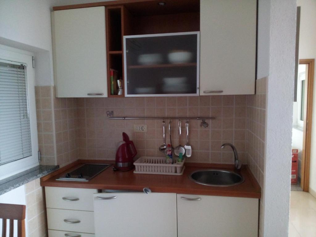 Kuchyň nebo kuchyňský kout v ubytování Apartments Villa Fernetich
