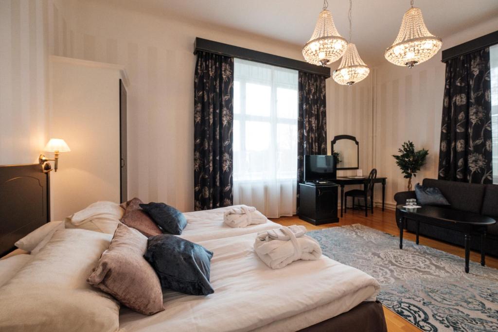 Postel nebo postele na pokoji v ubytování Badhotellet Spa & Konferens