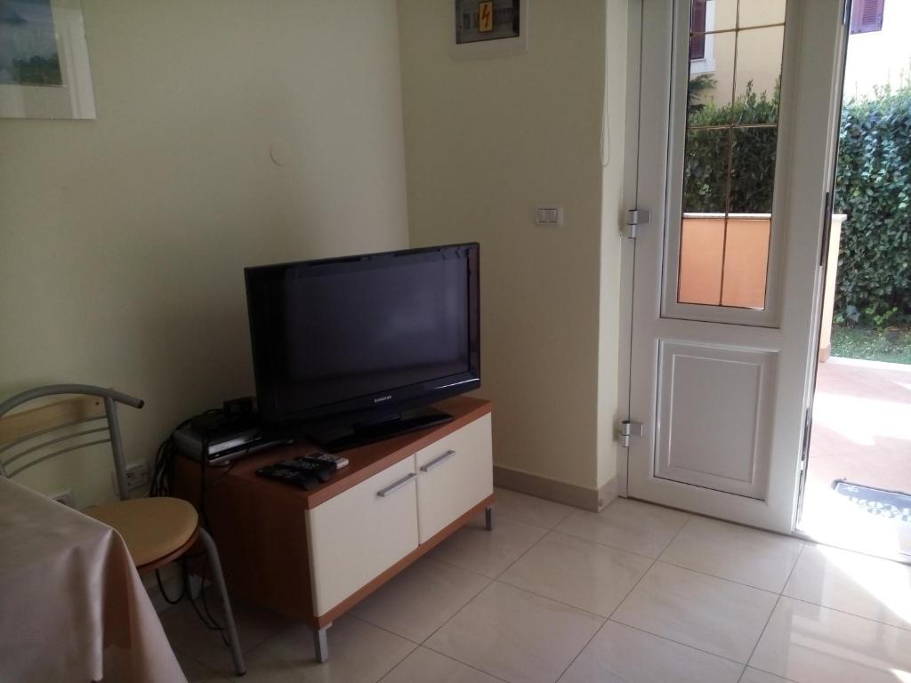 TV a/nebo společenská místnost v ubytování Apartments Villa Fernetich