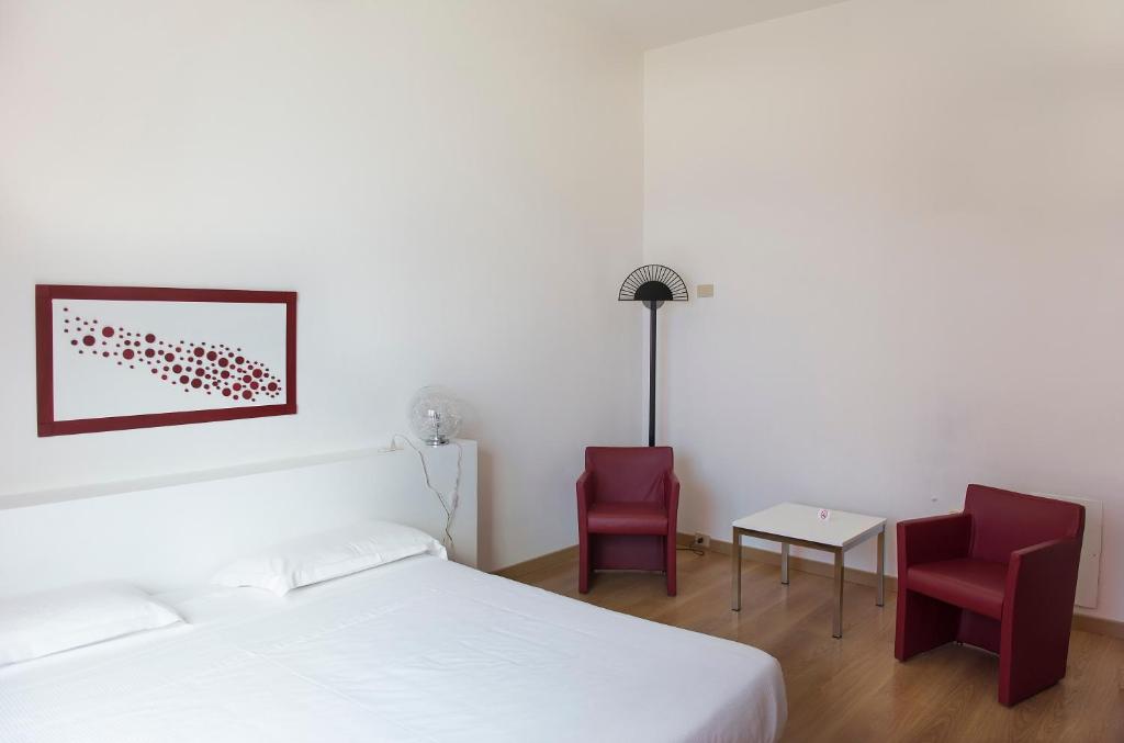 Postel nebo postele na pokoji v ubytování Park Hotel Residence