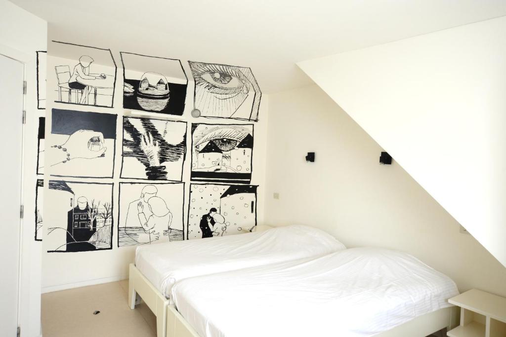 Postel nebo postele na pokoji v ubytování Focus Hotel