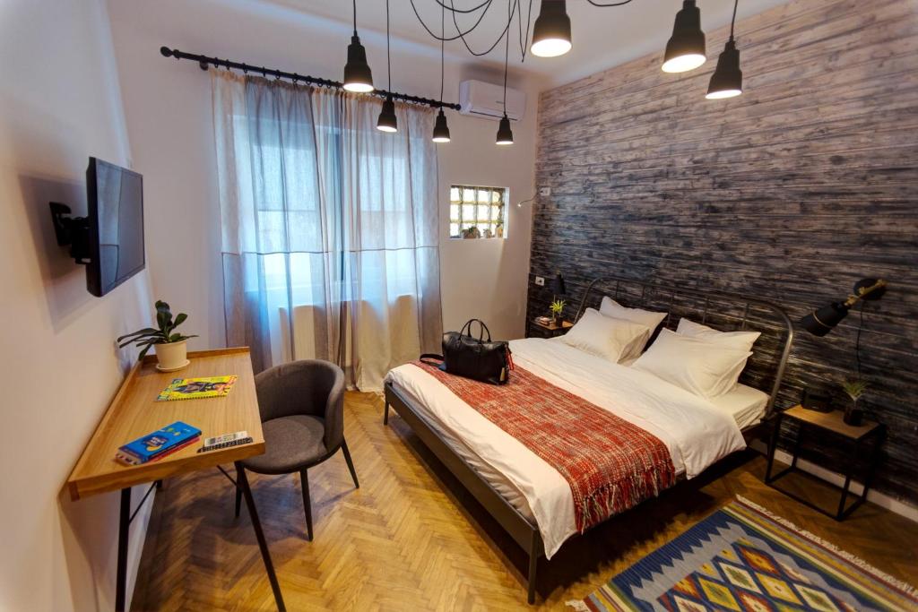 Postel nebo postele na pokoji v ubytování First Hostel