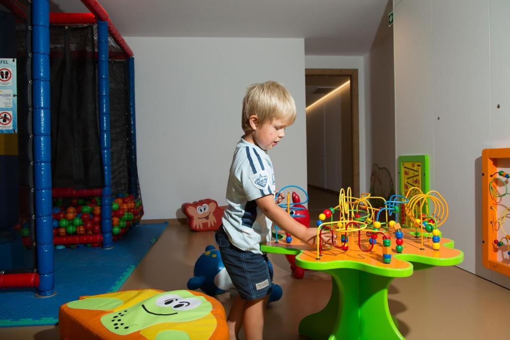 Dětský klub v ubytování Familienhotel Adler