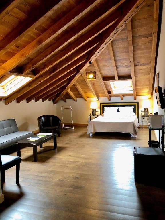 Postel nebo postele na pokoji v ubytování Palacio de Arce