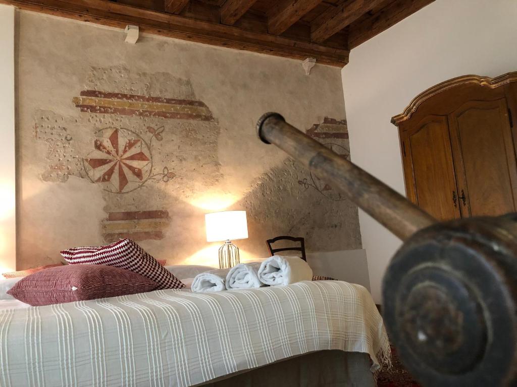 Postel nebo postele na pokoji v ubytování Pietra di Verona Residenza