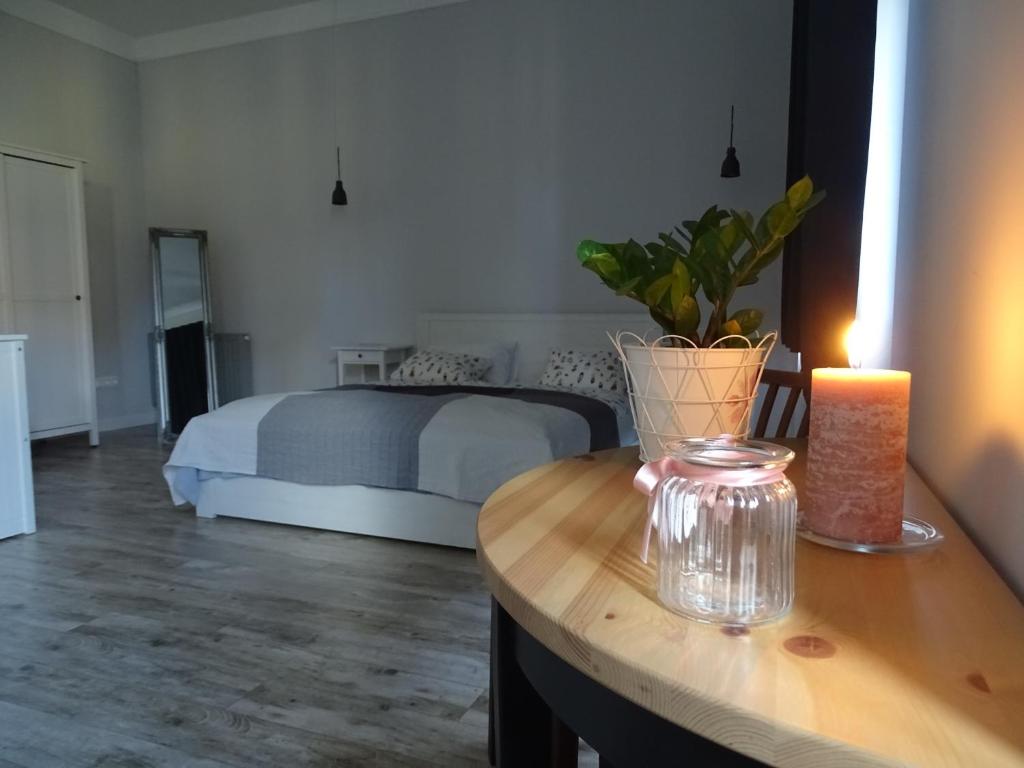 Posteľ alebo postele v izbe v ubytovaní Óváros Apartman