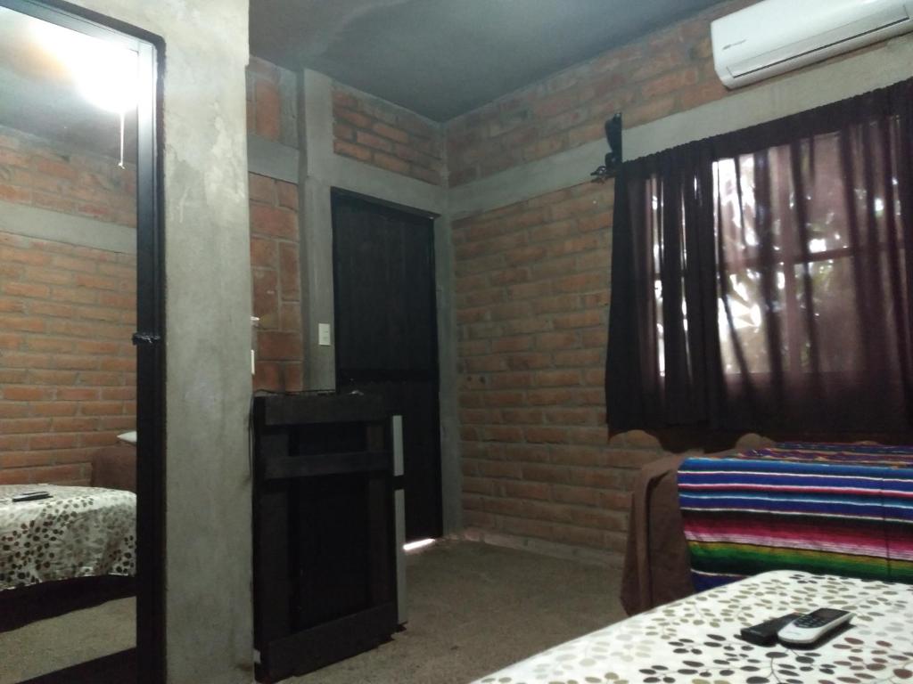 Postel nebo postele na pokoji v ubytování Posada Don Jose