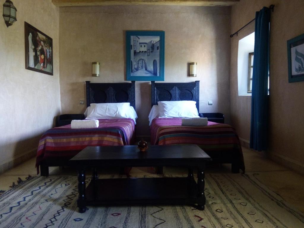 Voodi või voodid majutusasutuse La Kasbah d'Ouzoud toas