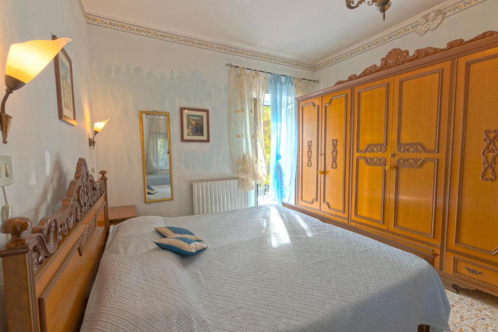 Postel nebo postele na pokoji v ubytování Camere Alisa