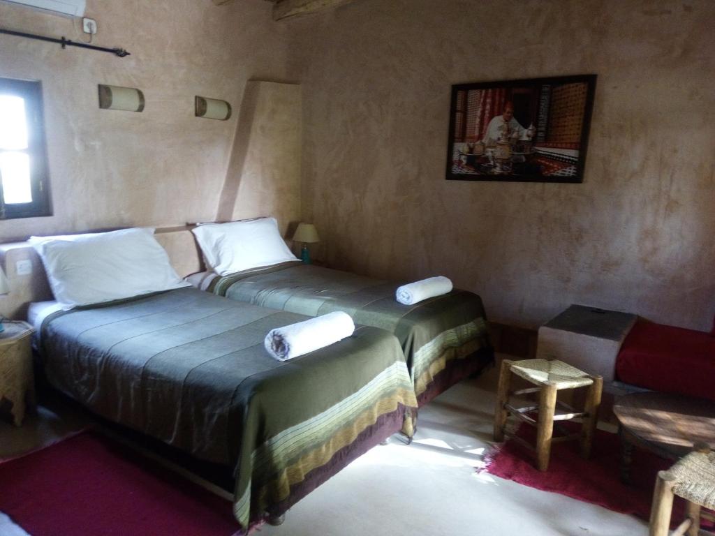 Voodi või voodid majutusasutuse La Kasbah d'Ouzoud toas