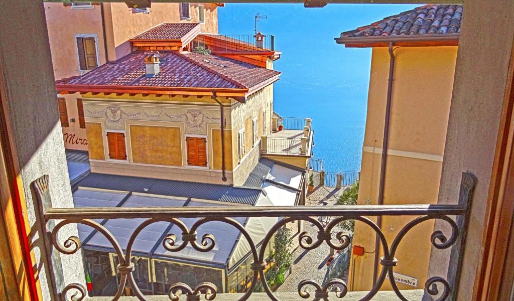 a view from a balcony of a building at Casa del Borgo Olga by Gardadomusmea in Tremosine Sul Garda
