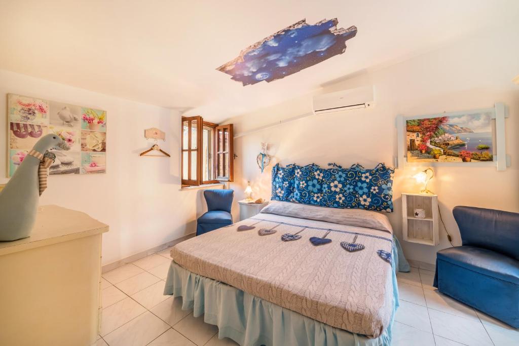 Posteľ alebo postele v izbe v ubytovaní B&B La Bouganville di Serena
