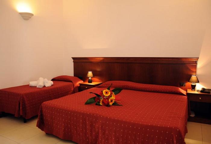 Postel nebo postele na pokoji v ubytování Agri Hotel Conte Salentino