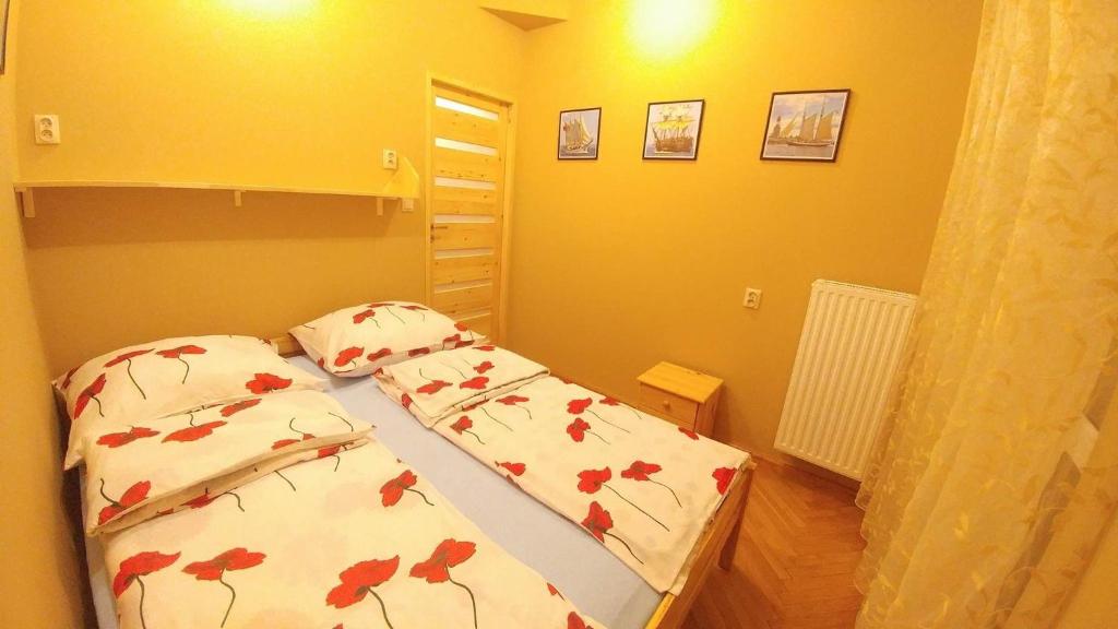 Postel nebo postele na pokoji v ubytování NavyBlue Apartments