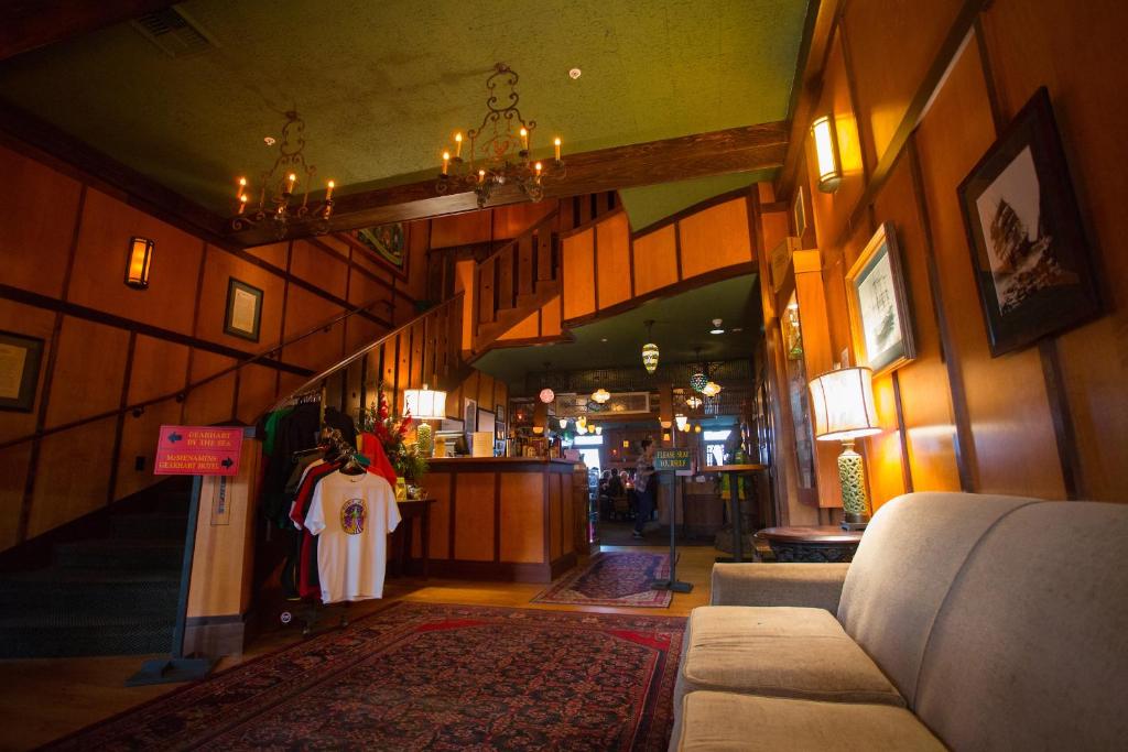 a hallway of a store with a person in a white robe at McMenamins Gearhart Hotel in Gearhart