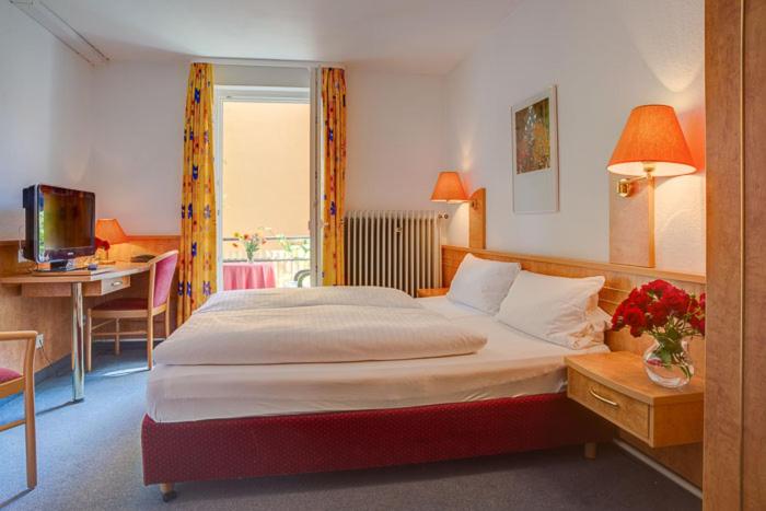 Postel nebo postele na pokoji v ubytování Hotel Möve garni