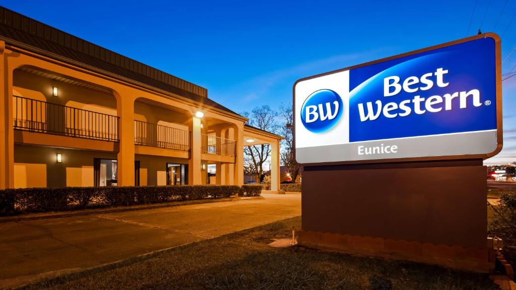 a best western sign in front of a building at Best Western Eunice in Eunice