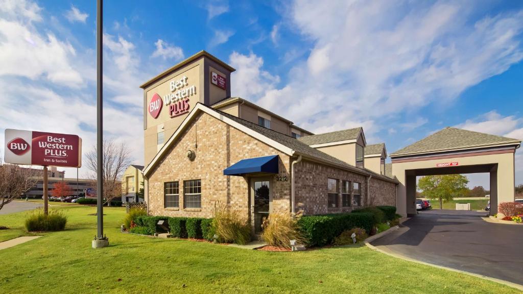 a fast food restaurant with a sign in front of it at Best Western PLUS Tulsa Inn & Suites in Tulsa