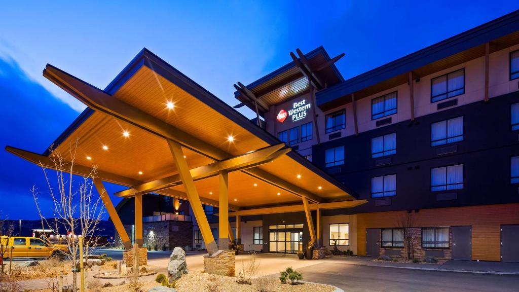 a rendering of a hotel with a large building at Best Western Plus Merritt Hotel in Merritt