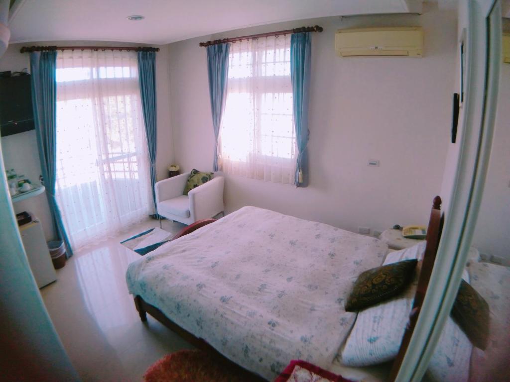 Postel nebo postele na pokoji v ubytování Riverside B&B