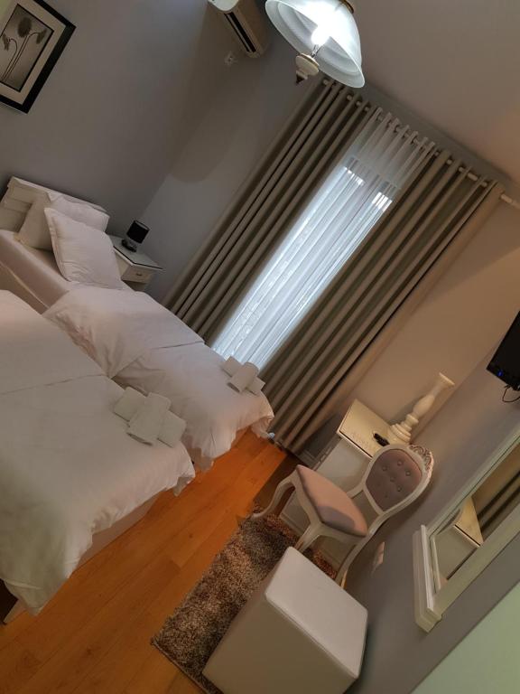 Postel nebo postele na pokoji v ubytování Univers Resort