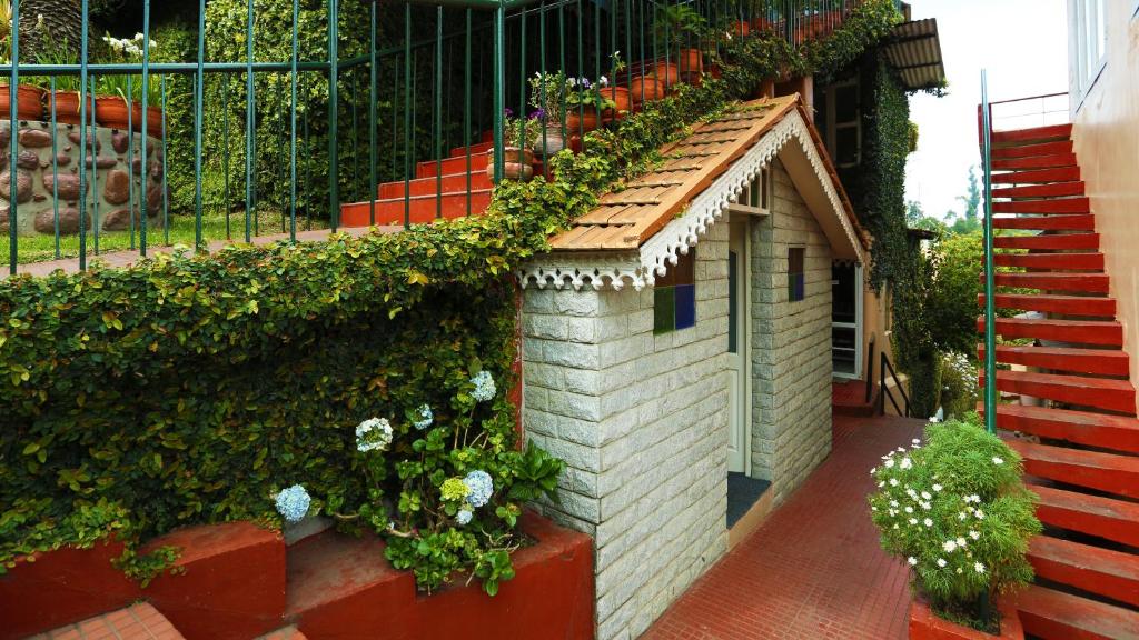 Zahrada ubytování Kodai Resort Hotel, Kodaikanal