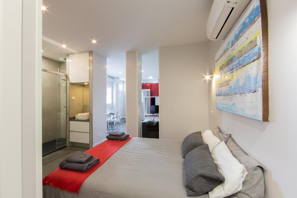 A bed or beds in a room at WindRose 1