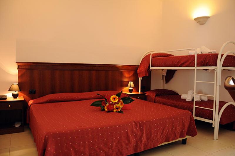 Postel nebo postele na pokoji v ubytování Agri Hotel Conte Salentino