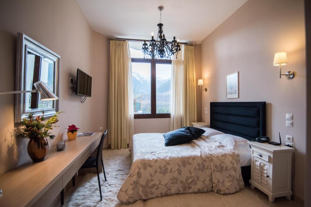 Postel nebo postele na pokoji v ubytování Forest Suites Boutique Hotel