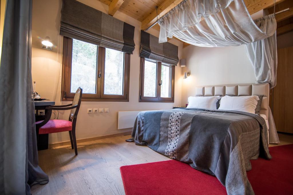 Postel nebo postele na pokoji v ubytování Forest Suites Boutique Hotel