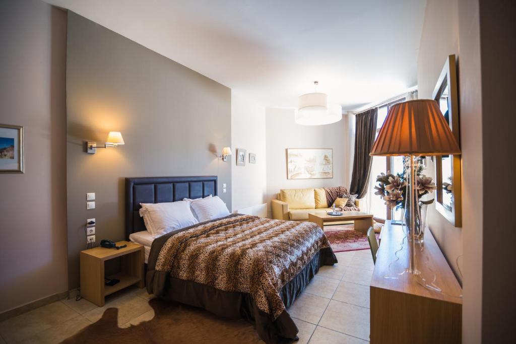 Postel nebo postele na pokoji v ubytování Forest Suites Boutique Hotel