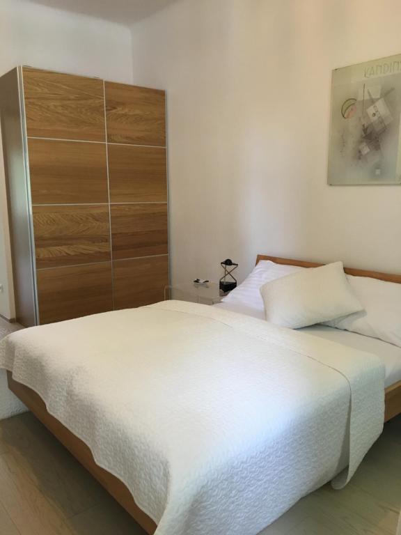 Postel nebo postele na pokoji v ubytování Hotel Wiener Kindl