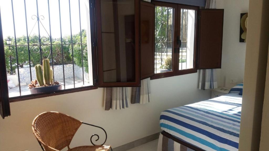 Postel nebo postele na pokoji v ubytování Casa al borde del mar