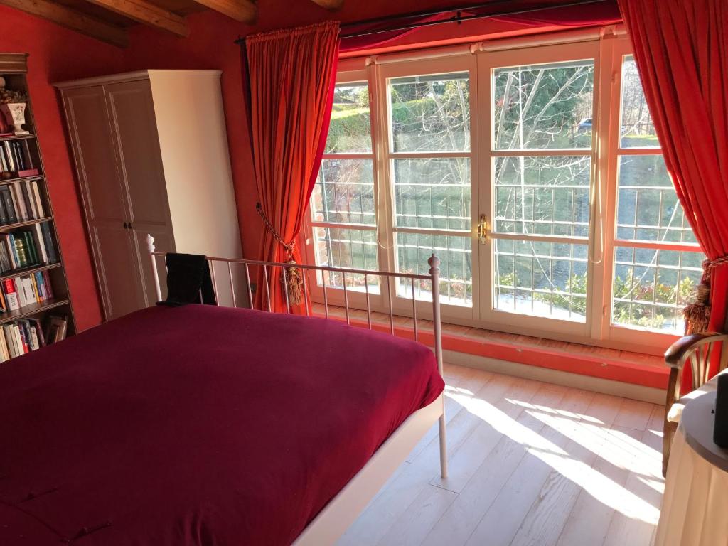 A bed or beds in a room at Casa Colli Piacentini