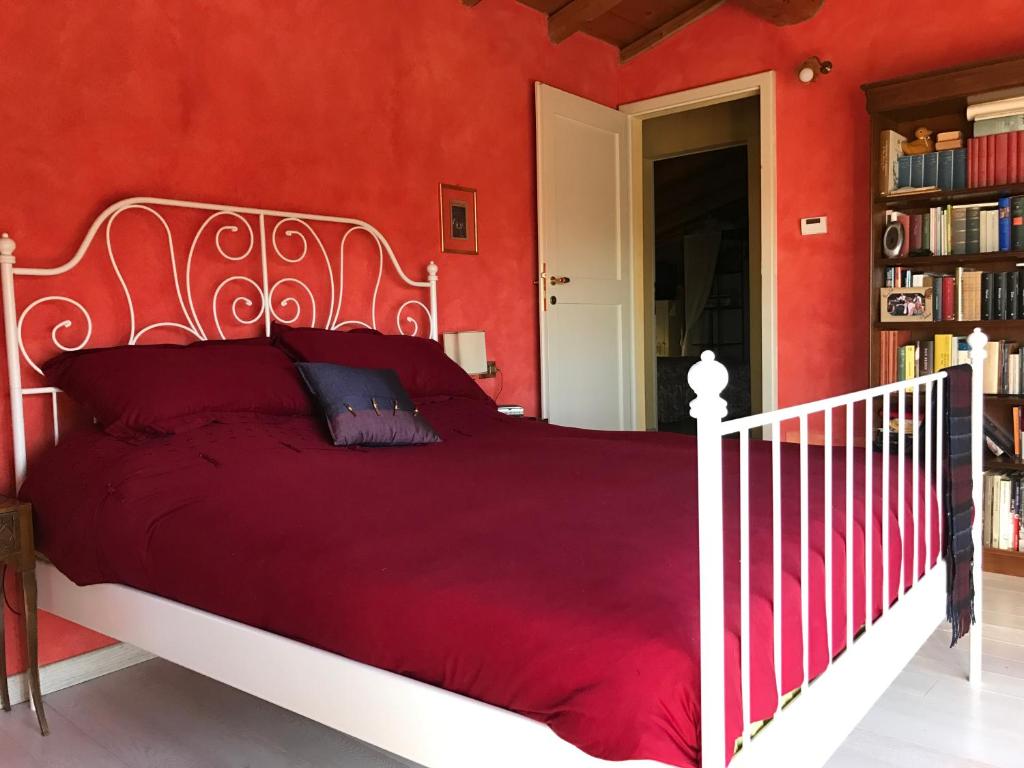 A bed or beds in a room at Casa Colli Piacentini