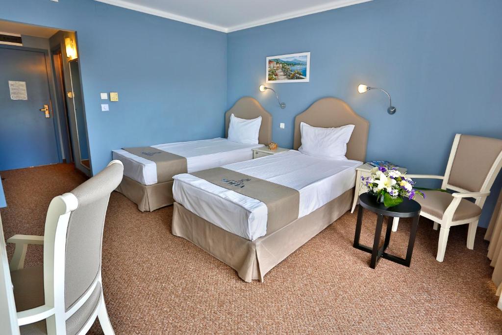 Postel nebo postele na pokoji v ubytování Sofia Hotel - All Inclusive & Private Beach