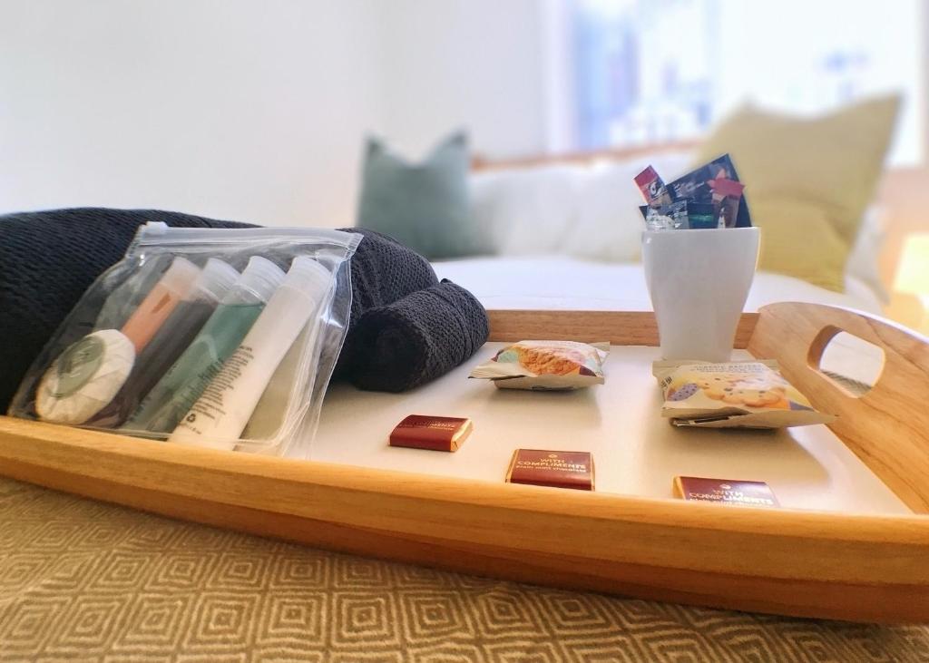 a wooden tray with food on top of a table at Castle Terrace (B3 R2) in Tipton